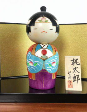 Bambola Kokeshi Momotaro